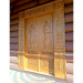 Carved church doors with archangels Michael and Gabriel