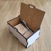 Dymba in a white case