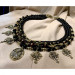 Necklace "Virgin Mary with blooming crosses"