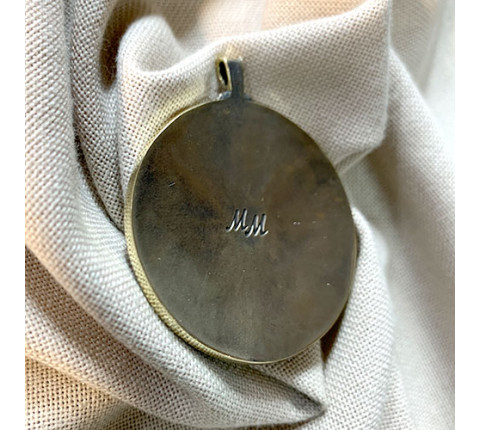 Handmade "Arcana" pendant made of brass