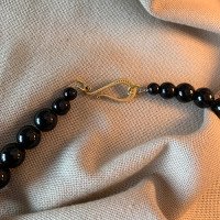 Necklace "Black Eyes Like Sloe" handmade from brass