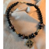 Necklace "Black Eyes Like Sloe" handmade from brass