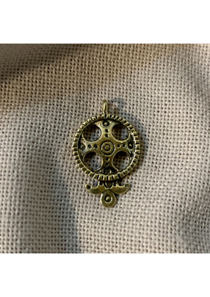 Pendant with a cross — author's handmade work made of brass