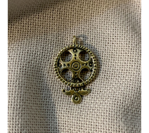 Pendant with a cross — author's handmade work made of brass