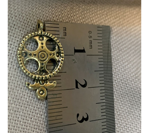 Pendant with a cross — author's handmade work made of brass