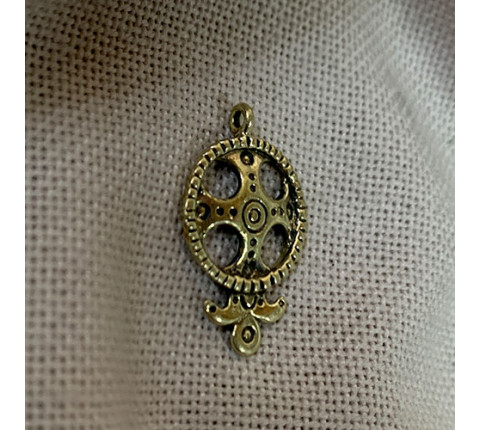 Pendant with a cross — author's handmade work made of brass