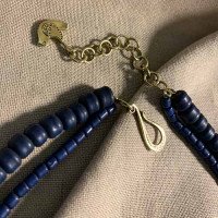 Handmade "Blooming Cross" necklace made of brass
