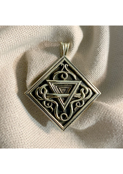 Handmade "Earth" pendant made of brass