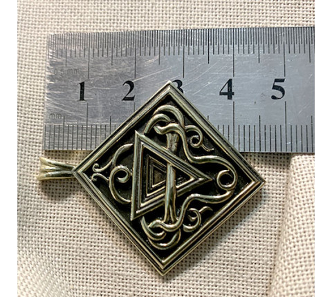 Handmade "Earth" pendant made of brass