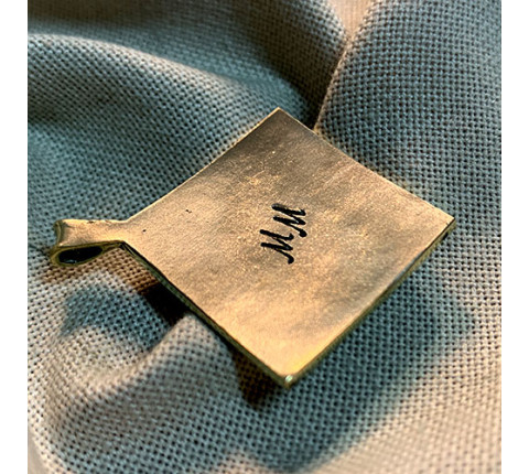 Handmade "Earth" pendant made of brass