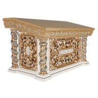 White tetrapod with gilded carving and grapevine.
