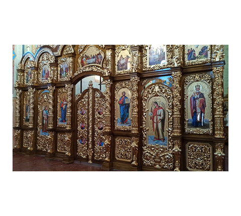 Two-tiered iconostasis made of alder with carvings and gilding with mirror gold.