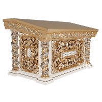 White tetrapod with gilded carving and grapevine.
