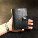 Black leather organizer for passport and documents
