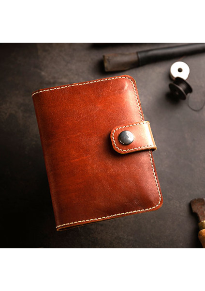 Leather organizer for passport and documents in brown color
