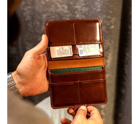 Leather organizer for passport and documents in brown color