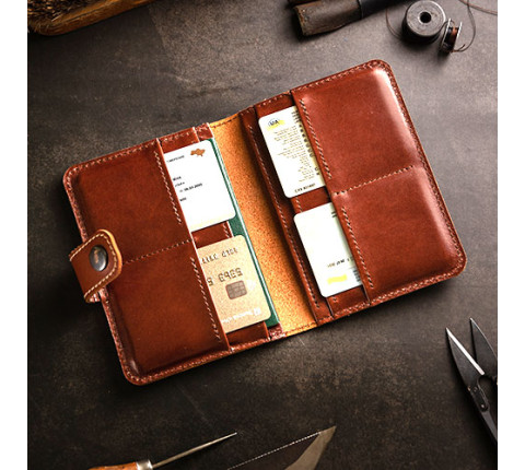 Leather organizer for passport and documents in brown color