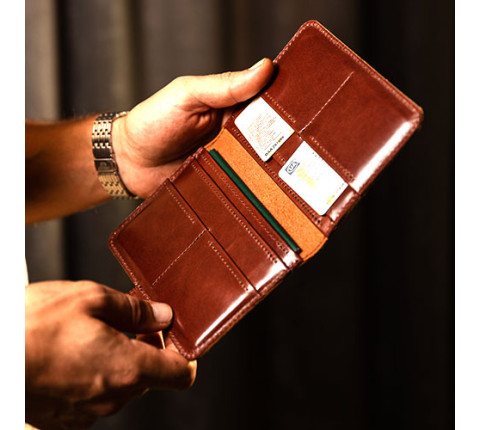 Leather organizer for passport and documents in brown color