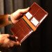 Leather organizer for passport and documents in brown color