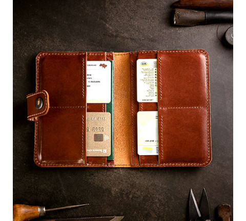Leather organizer for passport and documents in brown color