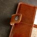 Leather organizer for passport and documents in brown color