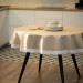 Round beige tablecloth