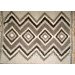 The "Hromovytsia" blanket is black and white, handmade.