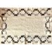 The "Tablecloth" blanket is black and white, handmade.
