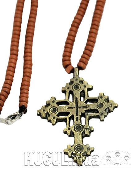 The chest decoration "Zgharda 020" is an exquisite brass accessory.