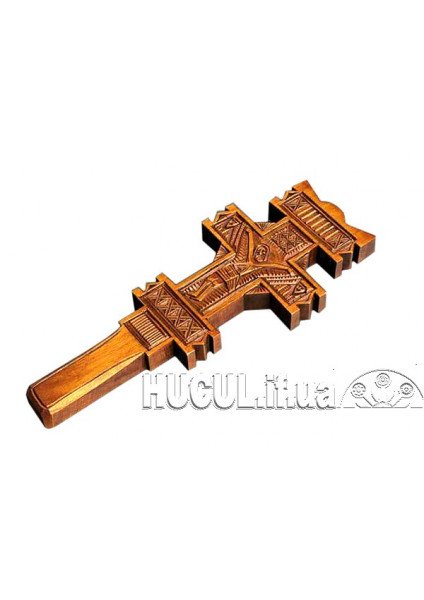 Bright cross with a carved image of the Crucifixion