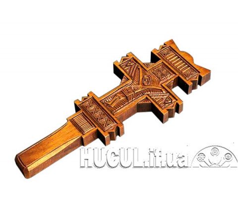 Bright cross with a carved image of the Crucifixion